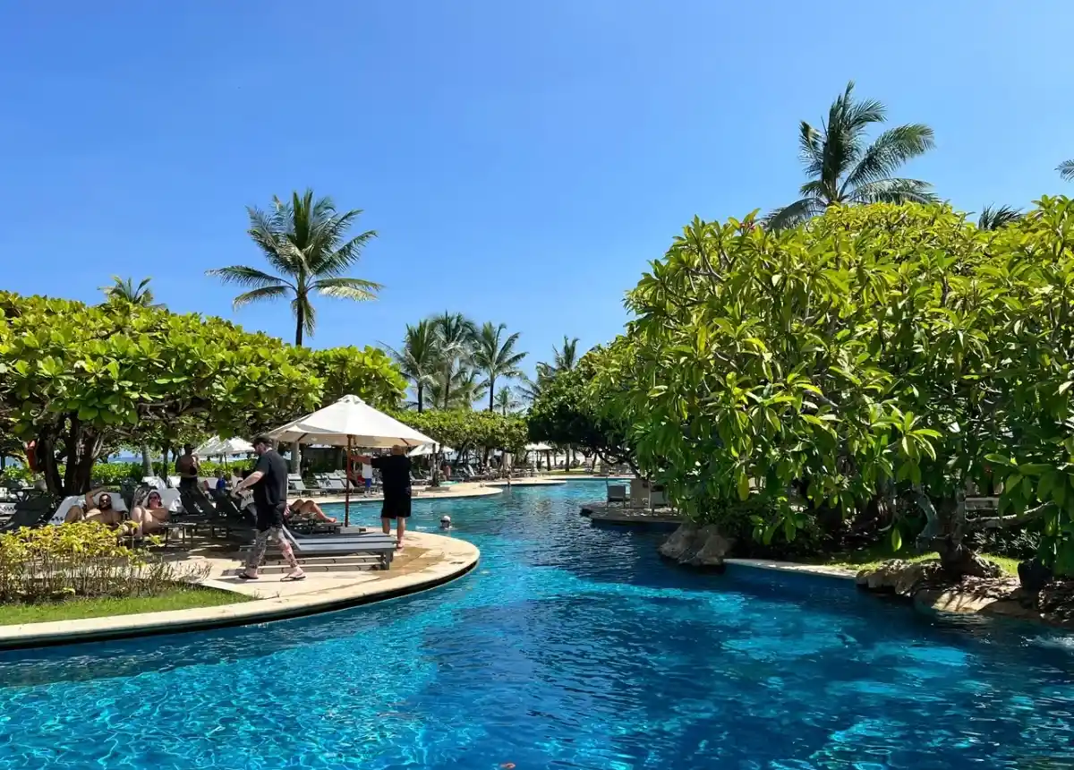 Garden River Pool at Grand Hyatt Bali surrounded by tropical landscaping